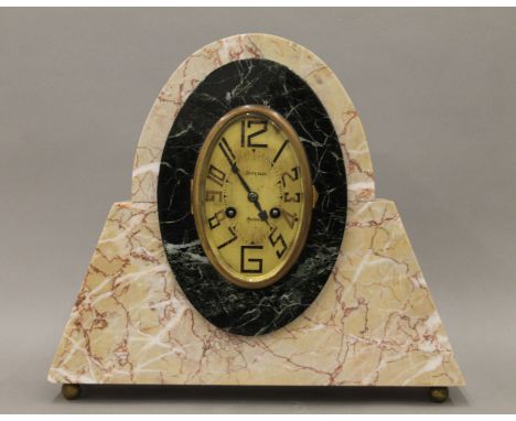 An Art Deco marble mantle clock. 31 cm high.