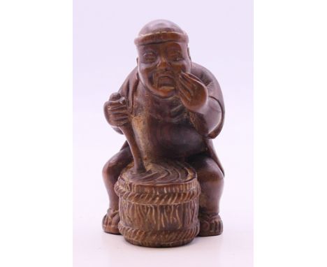 A netsuke formed as a man. 5.5 cm high. 