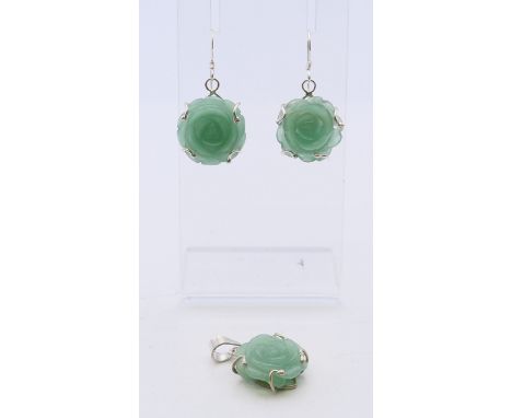 A pair of silver and jade earrings with a matching pendant. The latter 3 cm high. 