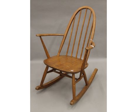 An Ercol rocking chair. 61 cm wide. 