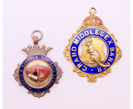 A silver gilt Masonic medal (Grand Middlesex Banner) engraved to reverse 'Presented to Bros S T Smith, 1959' and an enamel fo