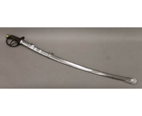 A sabre in steel scabbard. 107 cm long.