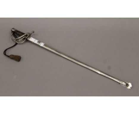 A vintage child's sword in scabbard. 54 cm long.