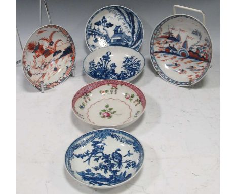Six English 18th century saucers including Worcester and LowestoftThe small dish with red decoration has crazing and some dis