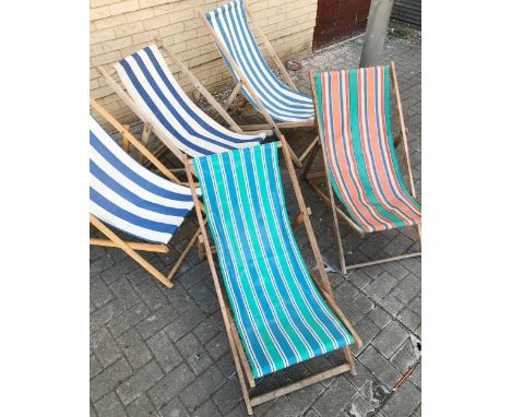 Five vintage folding deck-chairs with original striped fabricsframes generally very good and strucrurally sound with no obvio