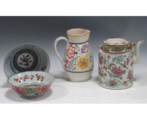 A Famille Rose teapot together with two Imari type bowls and a Poole jug (4)