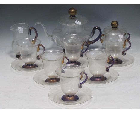 A Murano Glass tea set for six to include a teapot, milk jug, sugar bowl and five cups and saucersfading to the gilt collecti