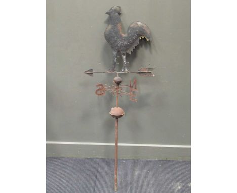 A metal cockerel weather vane, 137cm high, two metal wall sconces and a wall mounted bell