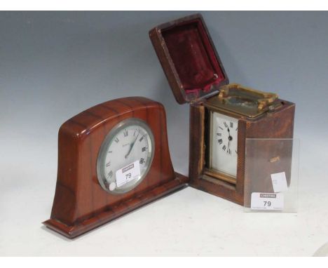 A French carriage clock together with another 8 day repeating mid century mantle clock