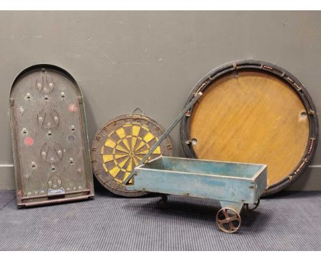 A bagatelle board together with a cork darts board, a puff billiards table and a painted wooden childs trailer (4)