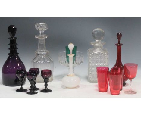 A collection of glassware to include, a cut glass decanter, a purple decanter together with four sherry glasses, seven wine g