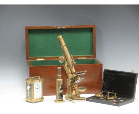 A brass microscope by Wood, and a basic microscope, scientific scales &amp; a French carriage clock.