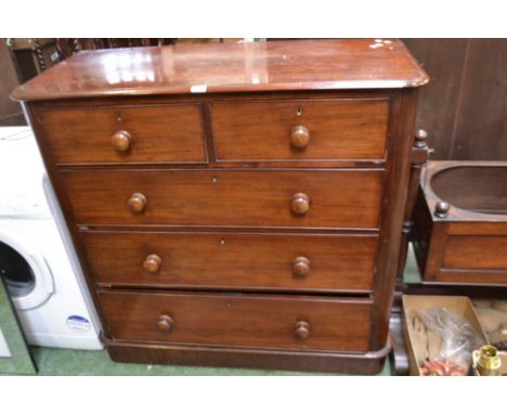 A Victorian mahogany chest, moulded top, two short cockbeaded drawers over three graduated long, button handles, plinth base,
