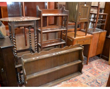 An oak rope twist low hall table; an oak pot stand; an oak barley twist occasional table; an Edwardian pot stand; an oak book