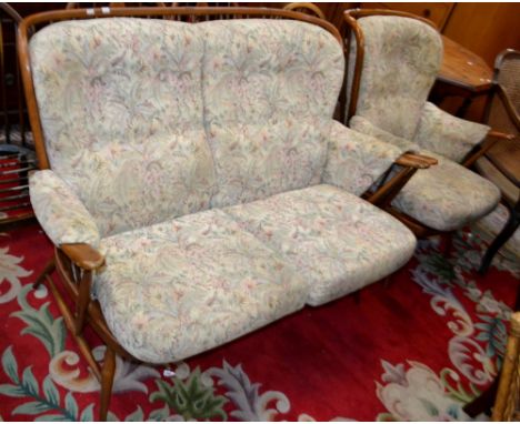 An Ercol Evergreen cottage suite, comprising a two seat sofa and armchair