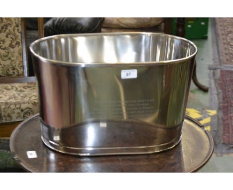 A modern chrome reproduction champagne trough, inscribed with Lily Bollinger quote 'I drink it when I'm happy and when I'm sa