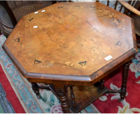 A late Victorian inlaid octagonal walnut occasional table, turned supports, undertier, ceramic casters.