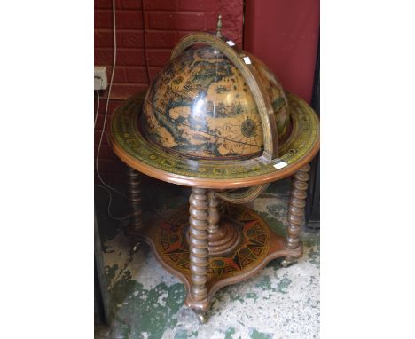 A cocktail cabinet in the form of a terrestrial globe.