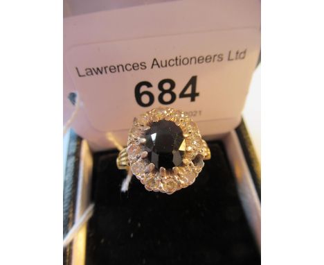 18ct Yellow gold oval sapphire and diamond cluster ring (minus one diamond) 