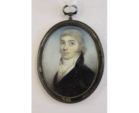 18th Century English school, watercolour portrait miniature of a young man looking upwards, 68mm x 55mm approximately, in a l
