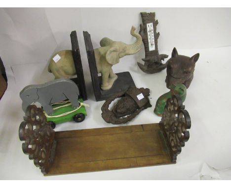 Victorian folding bookrack, painted wooden pull-a-long toy, pair of modern elephant book ends, cast iron door knocker, Black 