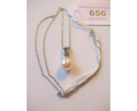 9ct White gold pearl and diamond pendant on a 9ct white gold chain 