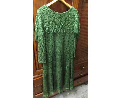 Ladies green dress by Dorville at Michael Geary, London, a Theo sequin and pearl embellished waistcoat, ladies velvet jacket 