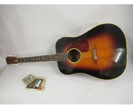 Swedish made acoustic guitar ' Levin 1900 ', bearing label for A. B. Herman Carlson Levin, in soft case with spare vintage st