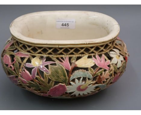 Zsolnay Pecs jardiniere of oval reticulated floral design, impressed and printed marks to base (firing crack to upper rim), 1