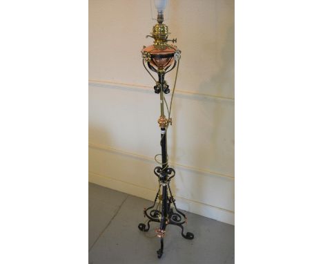 Arts and Crafts wrought iron, brass and copper mounted oil lamp standard adapted for use with electricity 