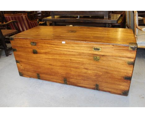Massive 19th Century camphor wood and brass bound trunk, the hinged lid with twin recessed brass handles to the front enclosi