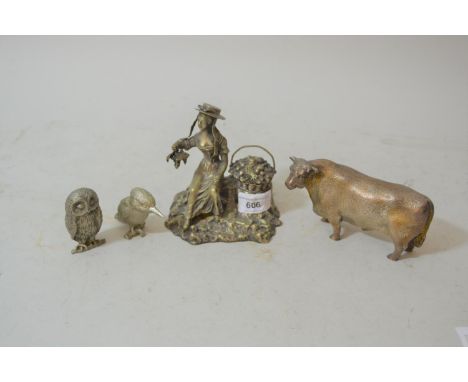 Silver plated inkwell in the form of a seated lady with bowl of fruit on naturalistic base, two silver plated figures of bird