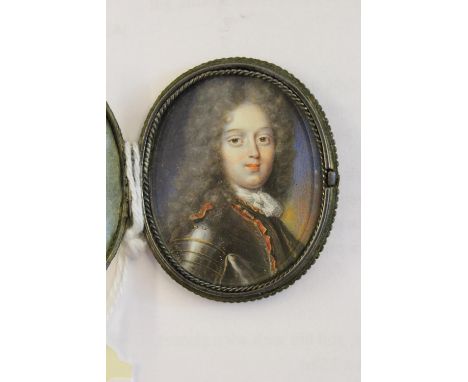 Early 18th Century English school, watercolour portrait miniature of a young James III wearing armour, in a glazed steel and 