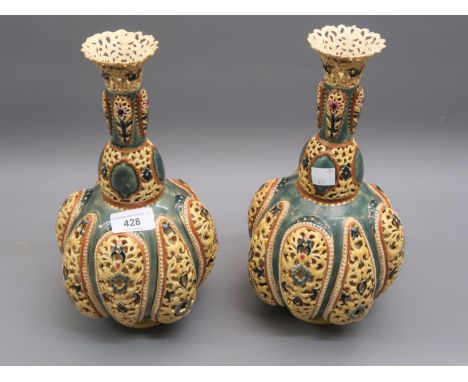 Pair of Zsolnay reticulated baluster form vases, 11.5ins high (with restorations) 