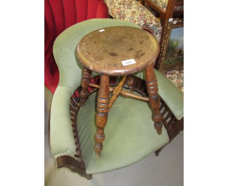 19th Century circular elm stool on bobbin turned supports with crossover stretcher 