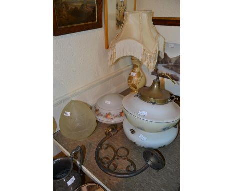 Art Deco style wall light with frosted shade, three various opaque glass hanging lamp shades, and an opaque glass floral deco