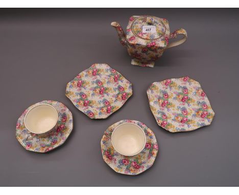 Royal Winton ' Spring ' Chintz pattern part tea service comprising:  teapot, two cups, two saucers and two side platesSome mi