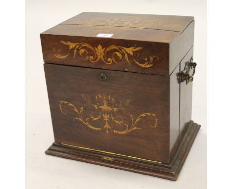 19th Century rosewood floral and urn inlaid decanter / games box having hinged cover, with mirrored and satinwood fitted inte