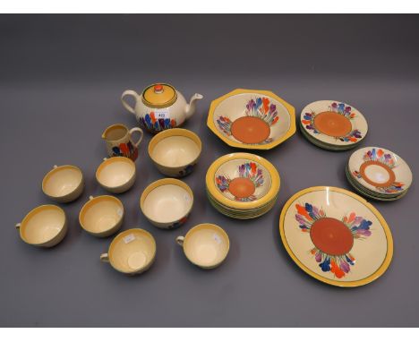 Clarice Cliff Bizarre Crocus pattern thirty one piece tea service including teapot and fruit set (9in plate chipped)Some dama