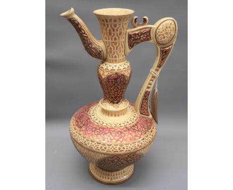 Zsolnay Pecs ewer form jug vase with shaped handle and spout, decorated in magenta and pink on a cream ground, 13.5ins high, 