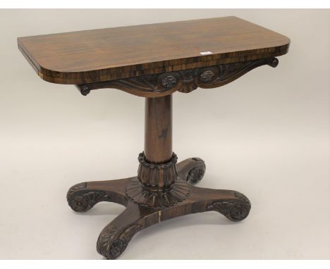 William IV rosewood fold-over card table with tulip carved column support and quadruped base, 36ins widePolish to top has som