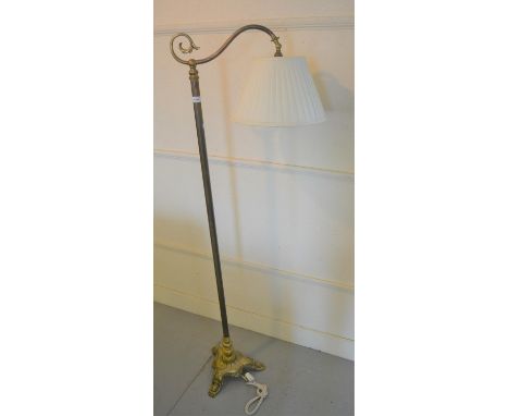 Brass lamp standard with a heavy cast triform base 