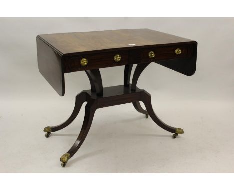 Regency mahogany and black line inlaid drop-leaf sofa table on a quadruped base and ormolu mounts, 36ins x 25ins 