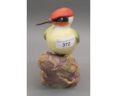 Modern Royal Worcester figure of a woodpecker, serial no. 3249, matt glazed, 7ins high 
