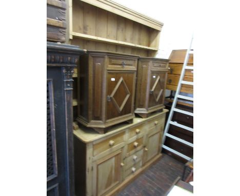 19th Century pine dresser, the boarded shelf back above an arrangement of six drawers and two moulded panel doors with knob h