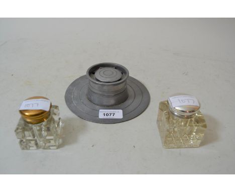 Pewter capstan inkwell together with two glass inkwells 
