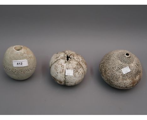 Alan Wallwork (1931 - 2019), pebble form vase, 5ins together with two sea urchin vases, 4.5ins and 3.75ins, all with incised 