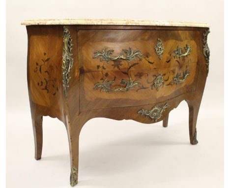 Late 19th / early 20th Century French Kingwood floral marquetry inlaid and ormolu mounted bombe commode, the marble top above