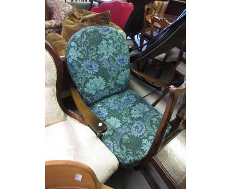 Mid 1970's Ercol armchair with a hoop and stick back, the cushions covered in William Morris chrysanthemum fabric, together w