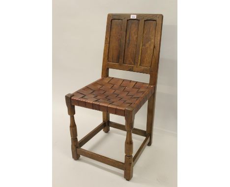 Sid Pollard (apprentice to Robert Mouseman Thompson), set of four oak dining chairs, the panel backs above leather seats and 